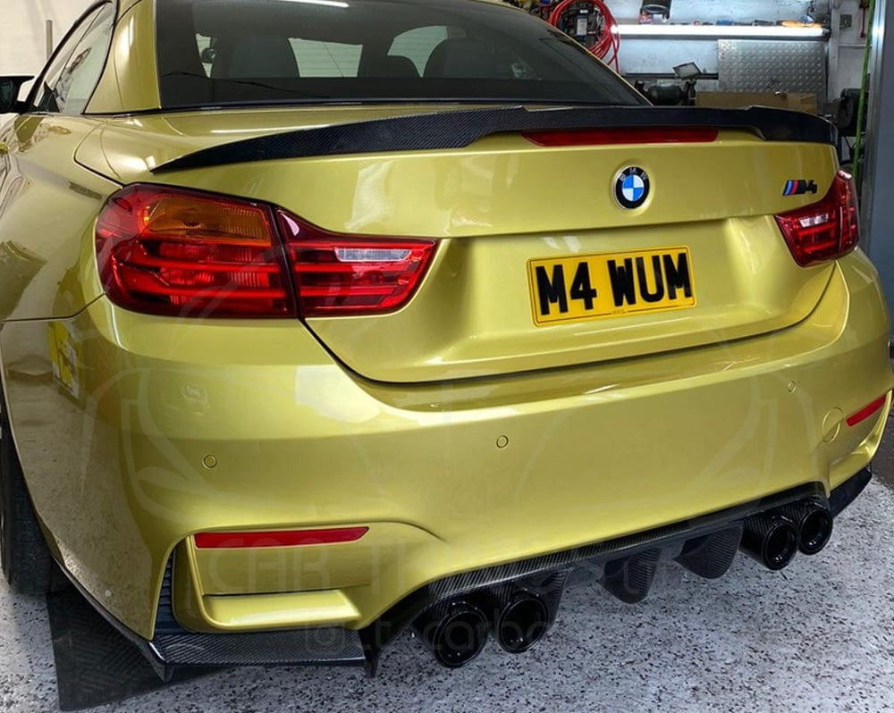 BMW M4 F83 and F33 4 Series carbon fibre spoiler by CT Carbon, showcasing sleek, lightweight aerodynamic car accessory.