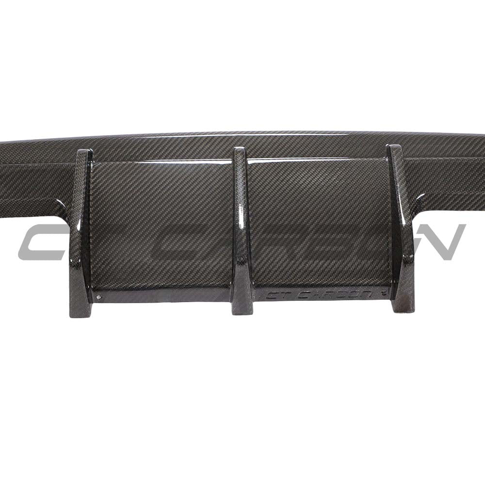 BMW M4 G82/G83 carbon fiber diffuser by CT Design, showcasing sleek, aerodynamic design with textured carbon fiber surface.