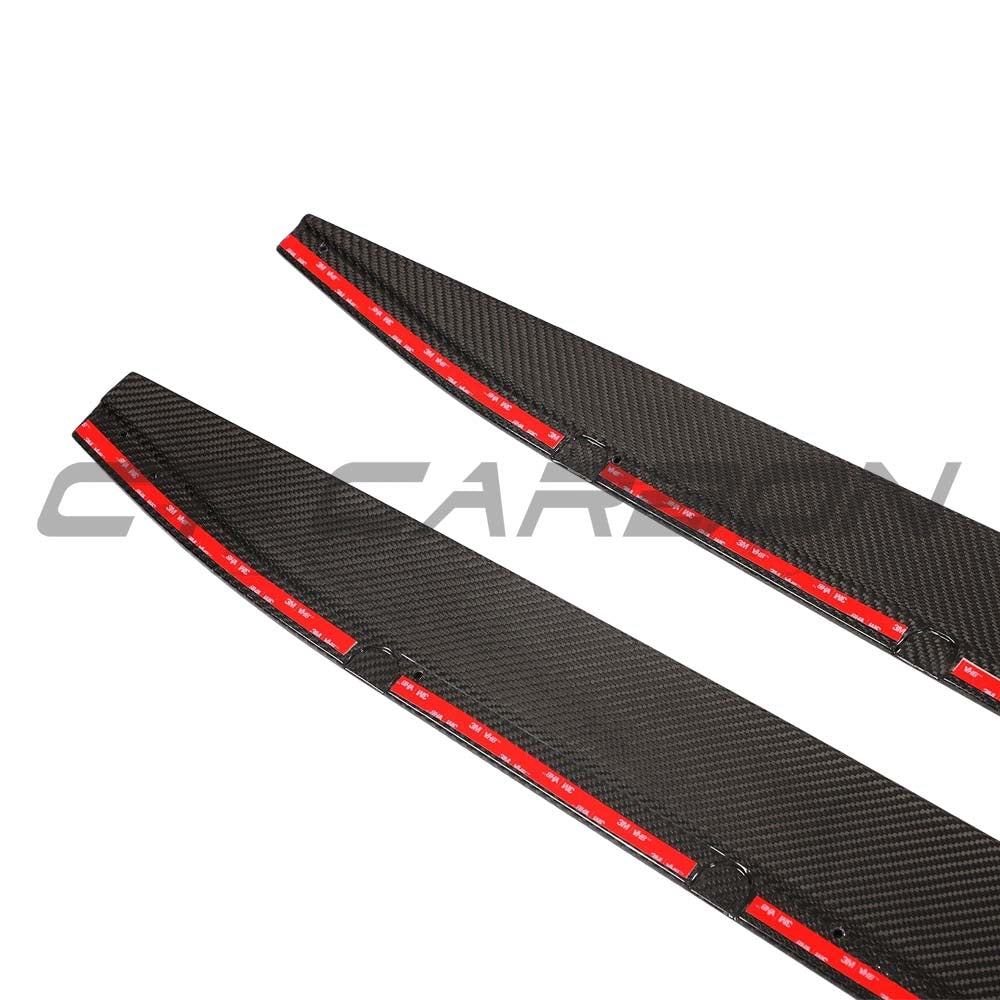 BMW G83 M4 full carbon fibre kit by CT Carbon, featuring side skirt extensions with a sleek, lightweight carbon fiber design.