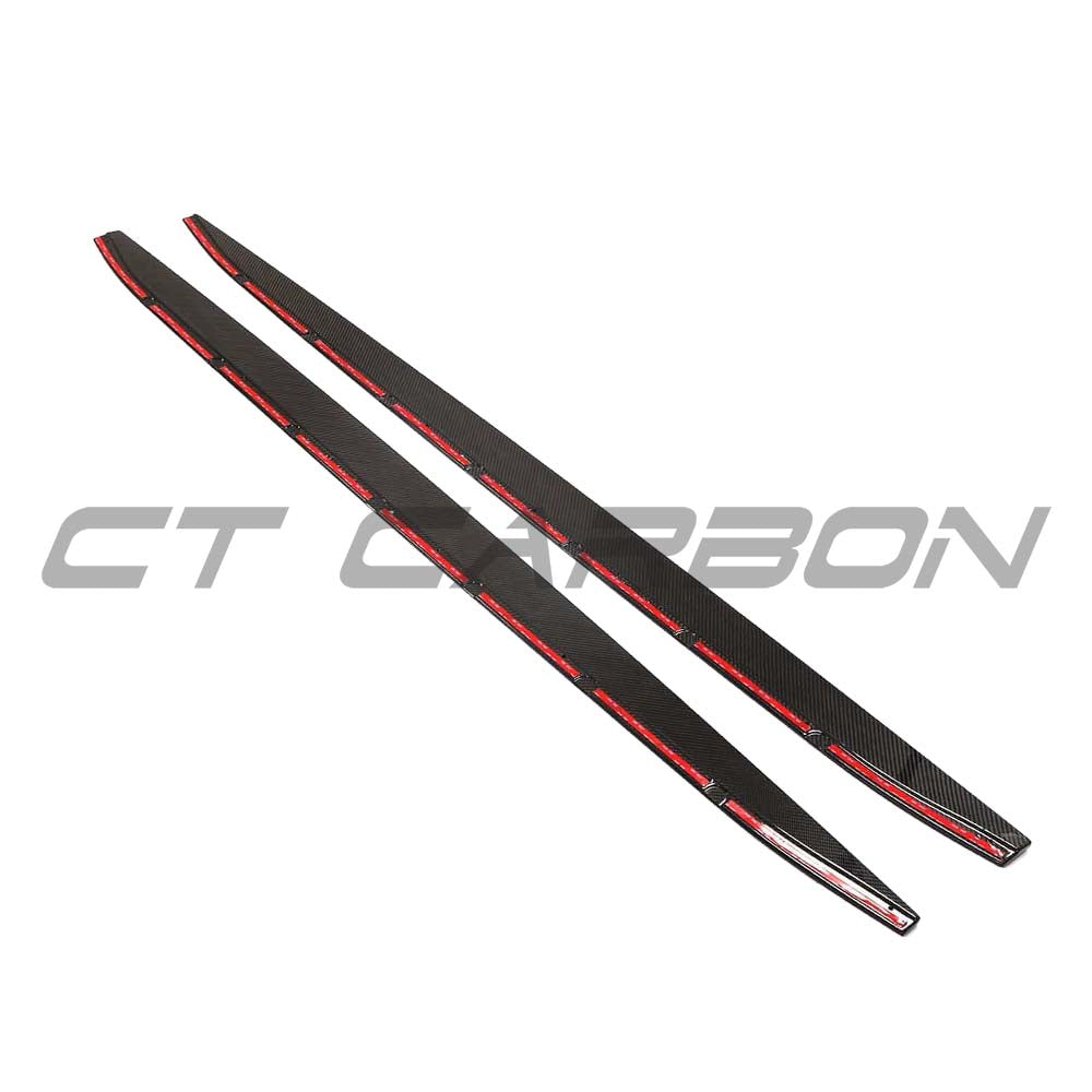 BMW G82 M4 carbon fibre side skirt extensions kit by CT Design, showcasing sleek, lightweight carbon fibre components on the car.
