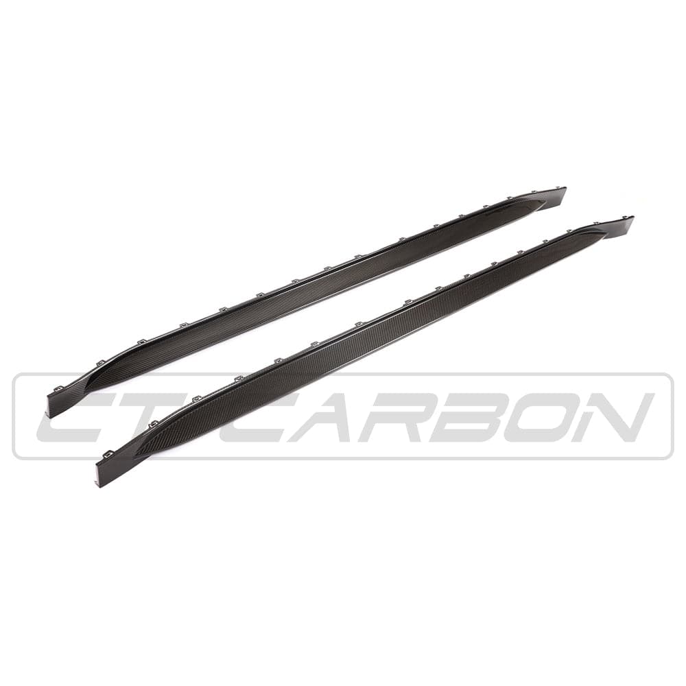 BMW M4 G83 carbon fibre kit by CT Carbon, showcasing sleek carbon fibre components on the sporty car.