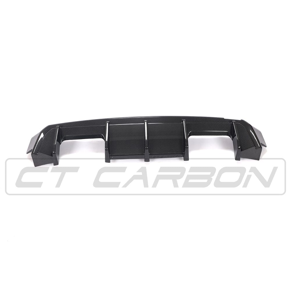 BMW M4 G83 full carbon fibre kit by CT Design, showing detailed carbon fibre components on the sporty car.