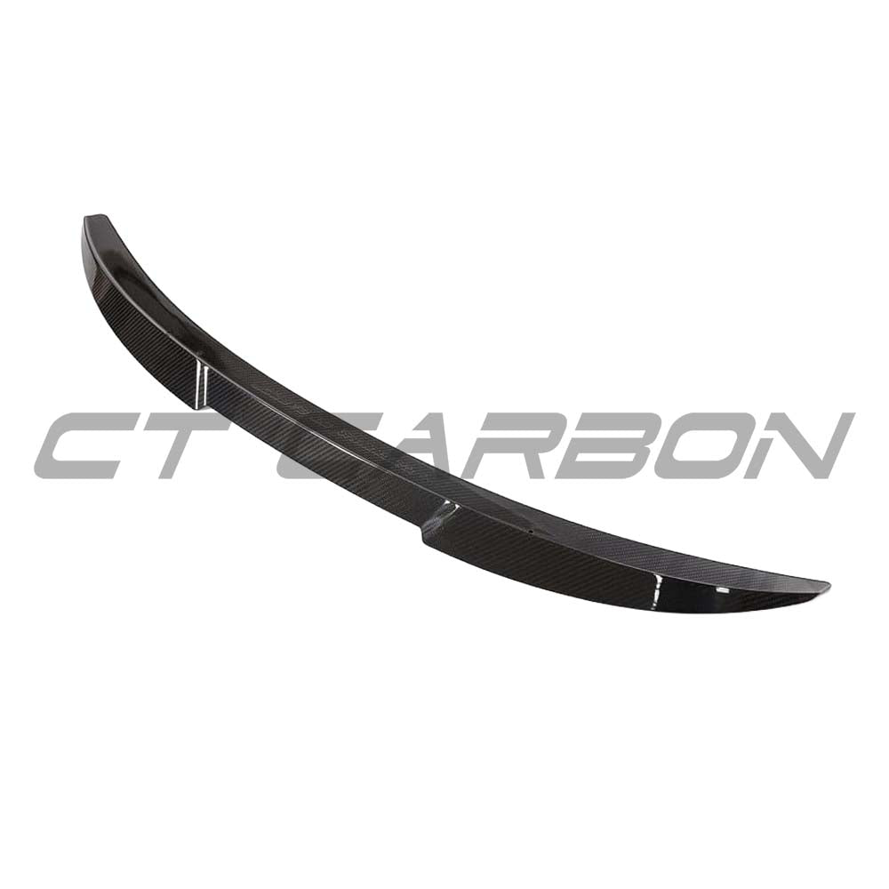 BMW G82 M4 full carbon fibre kit by CT Design, featuring a sleek carbon fibre spoiler and body components.