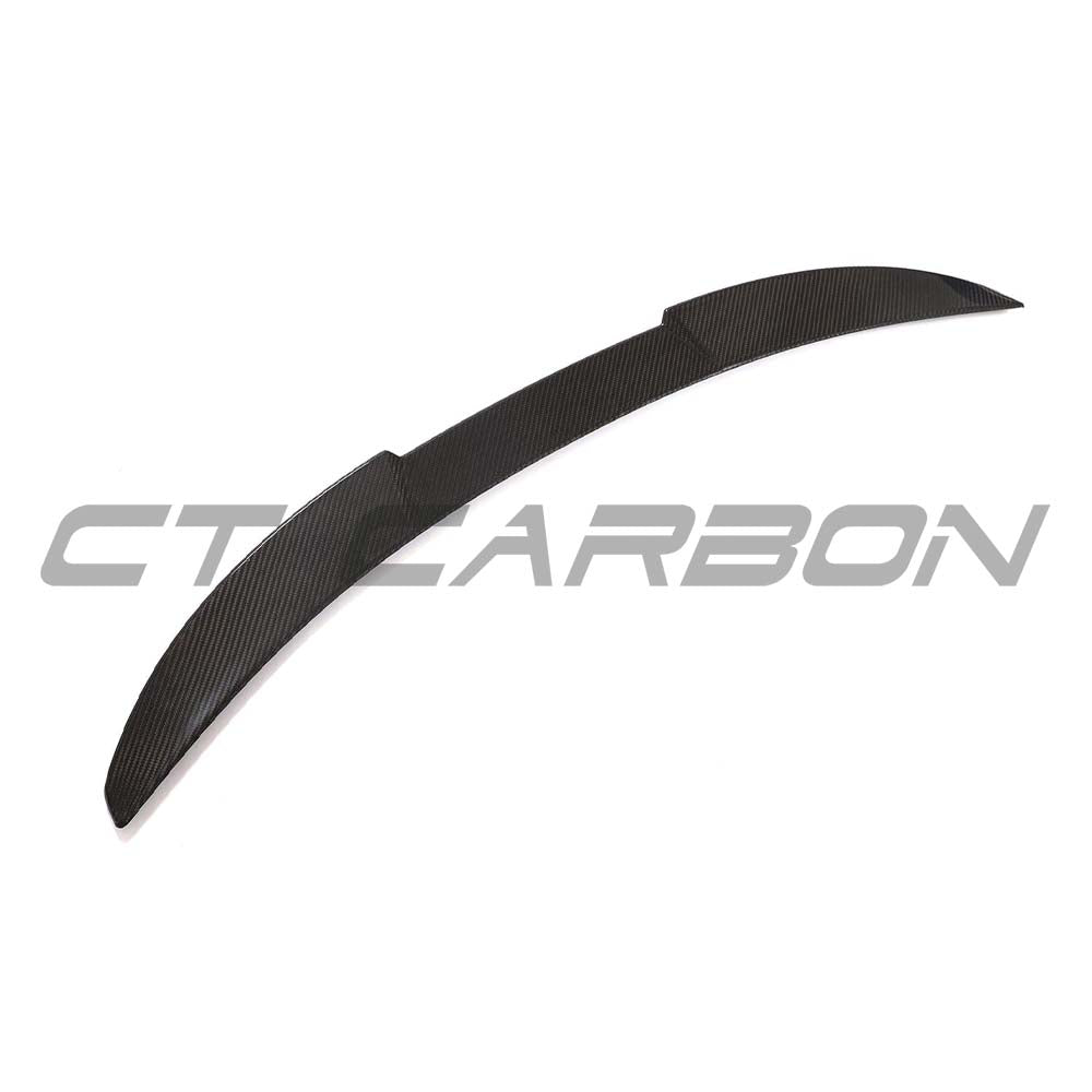 BMW G82 M4 full carbon fibre kit by CT Carbon, featuring a sleek carbon fibre spoiler and aerodynamic enhancements.