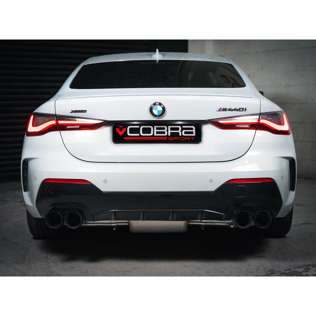 Cobra Sport BMW M440i G22 G23 quad exit valved GPF/OPF back performance exhaust system in black finish.