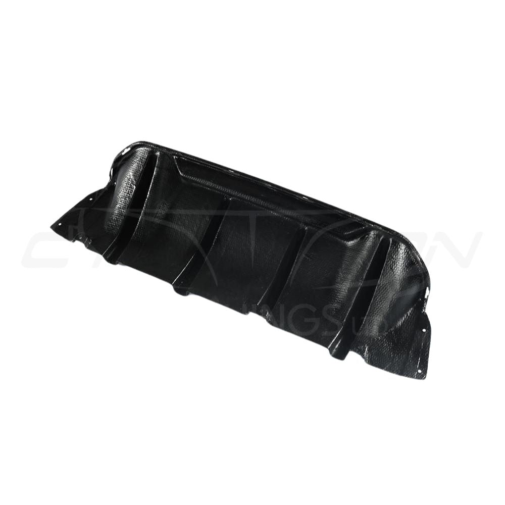 BMW M5 F90 carbon fibre diffuser by CT Carbon, V1 style, showcasing sleek aerodynamic design and high-quality carbon fiber material.