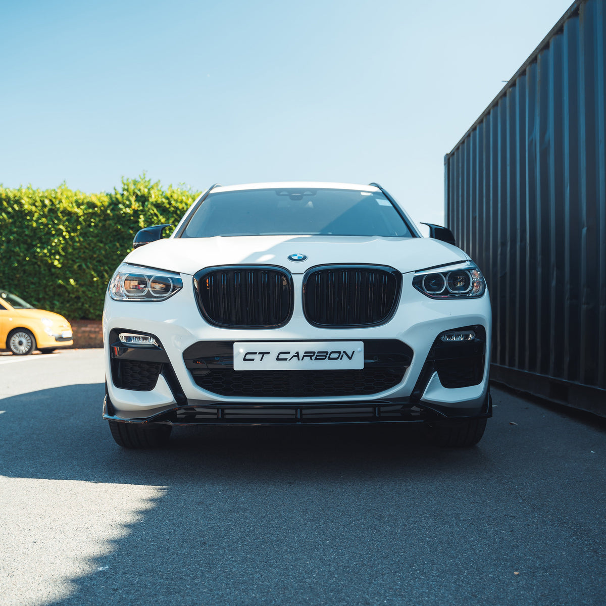 BMW X3 G01 2017-2020 full gloss black kit with exhaust tips by CT Carbon, shown on a white background.