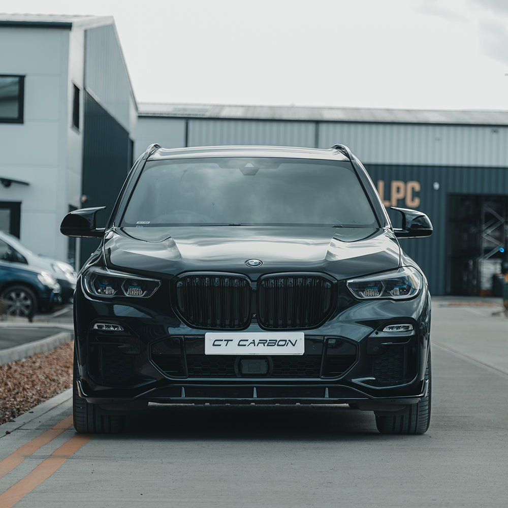 BMW X5 G05 2018+ black double slat grille by CT Carbon, featuring glossy black finish and sleek design.