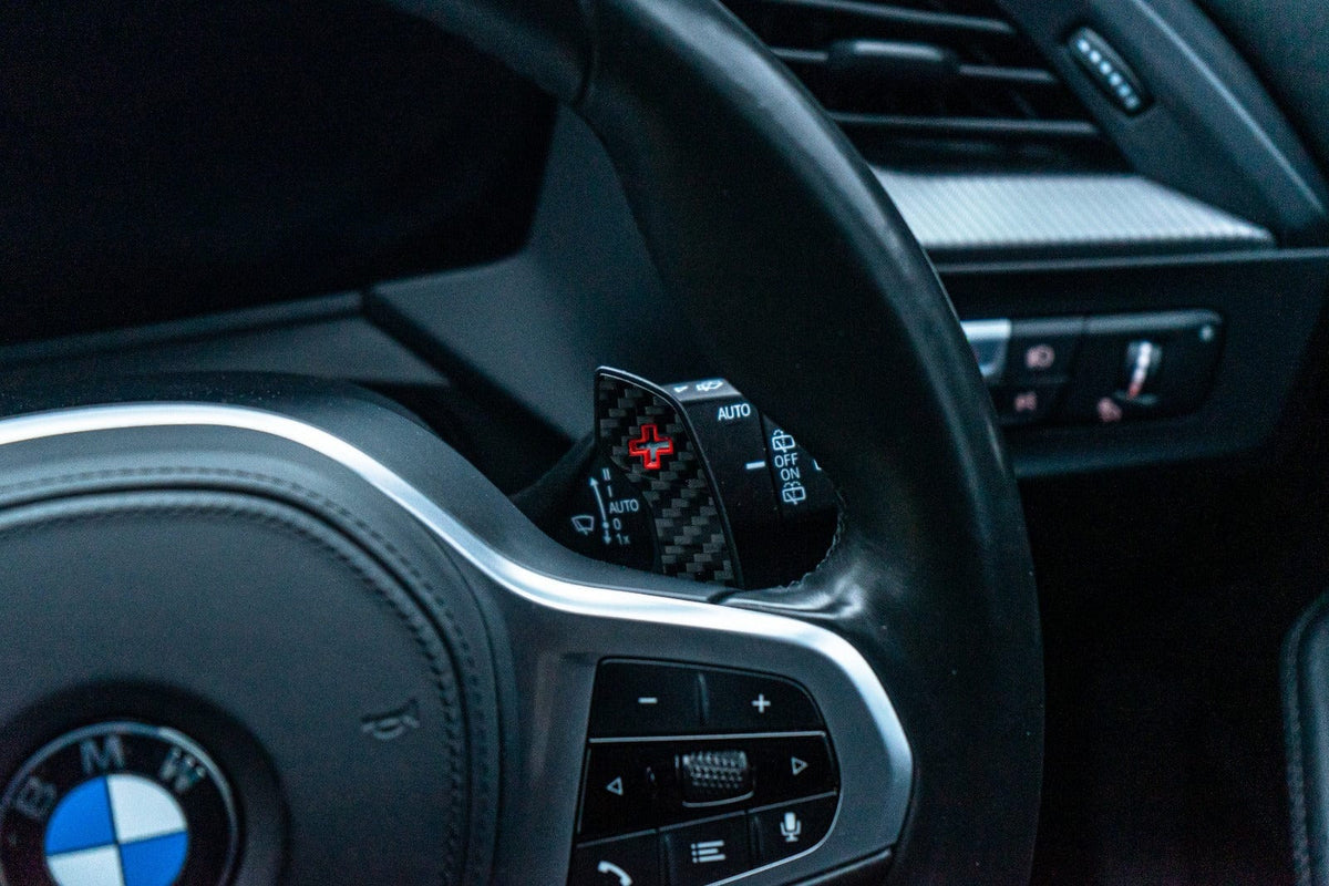 BMW Mini Fxx Gxx carbon fiber shift paddles from CT Carbon, showcasing sleek, lightweight design for sporty interior accents.