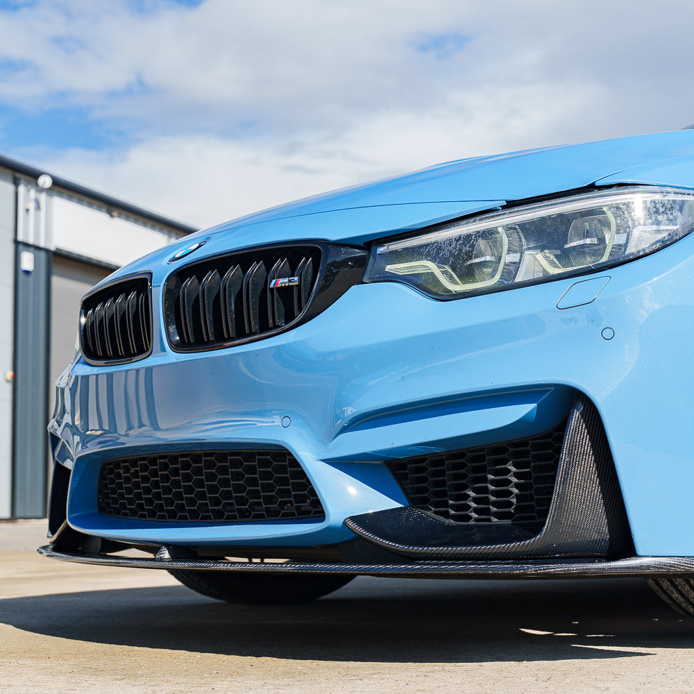 Blue BMW M3 F80 full carbon fiber kit by CT Carbon, showcasing lightweight, high-performance carbon fiber components for the vehicle.