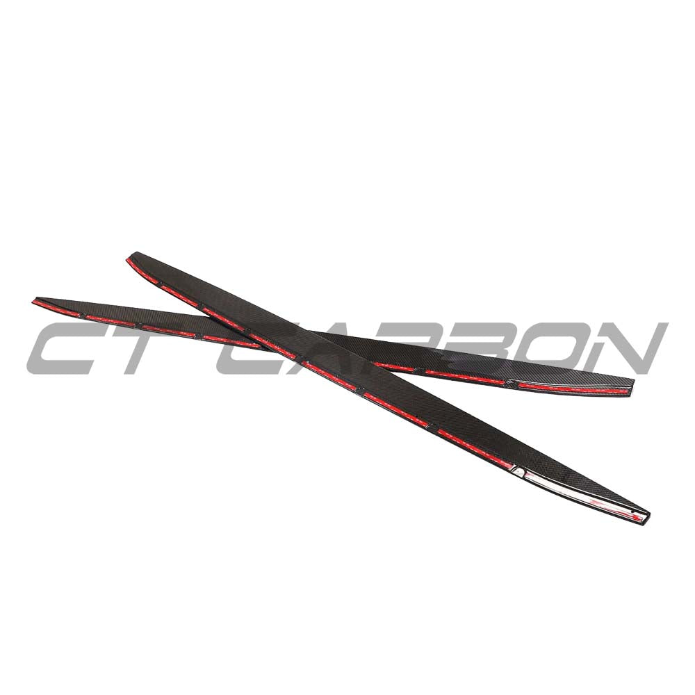 BMW G80 M3 full carbon fiber kit by CT Carbon, featuring V6 design, displayed on a sleek car showcasing carbon fiber components.