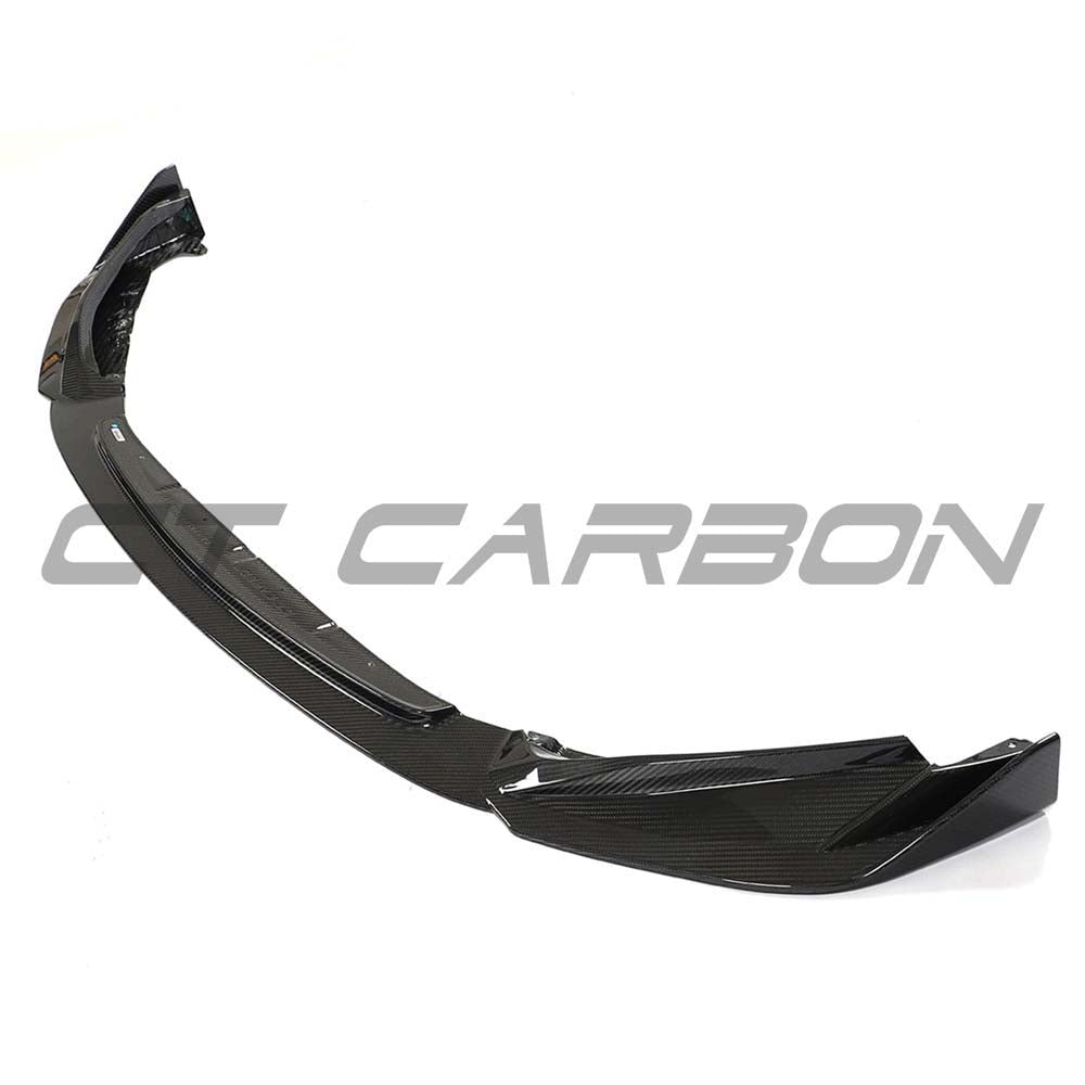 BMW G80 M3 full carbon fibre kit by CT Carbon, including front splitter and aerodynamic parts, showcased on a sleek car.