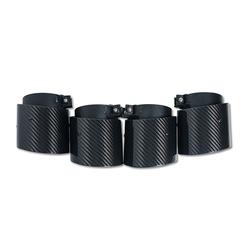 Set of four black carbon exhaust tips for BMW M2, M3, M4 G87, G80, G81, G82, G83 by CT Carbon, slash cut style.