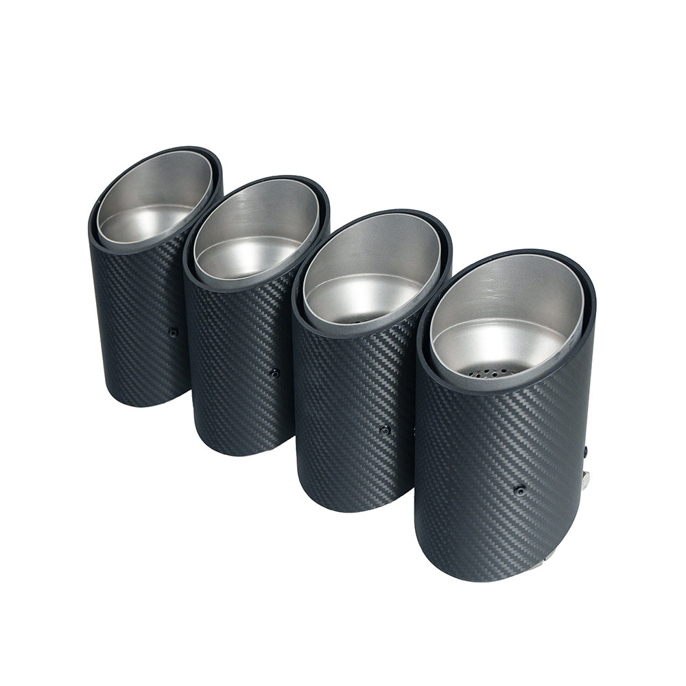 Chrome carbon fibre slash cut exhaust tips for BMW G90 M5 and G99 M5 Touring by CT Carbon, showcasing sleek metallic finish.