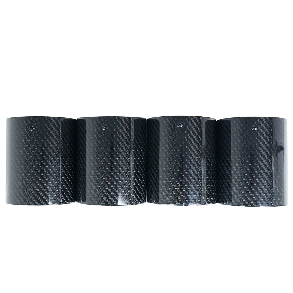 Set of four BMW F90/F92 M5/M8 carbon fiber exhaust tips with chrome finish by CT Carbon, showcasing sleek, polished design.