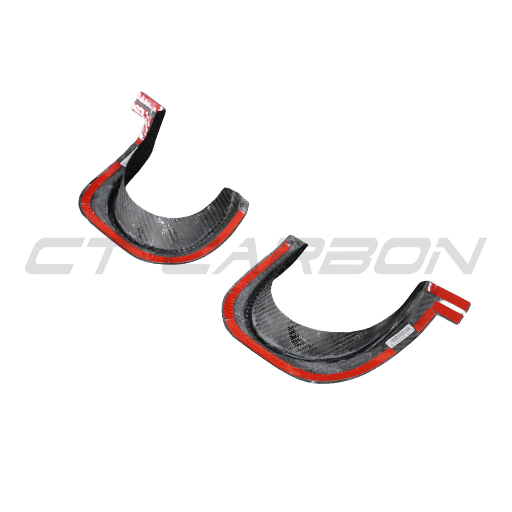 Carbon fiber exhaust diffuser cover for Toyota Supra A90 2019+ by CT Carbon, showing sleek textured finish and precise fit.