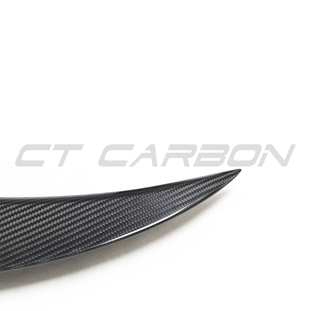 BMW 8 Series M8 G16/F93 carbon fiber spoiler by CT Carbon, showing sleek, aerodynamic design for sporty vehicle enhancement.