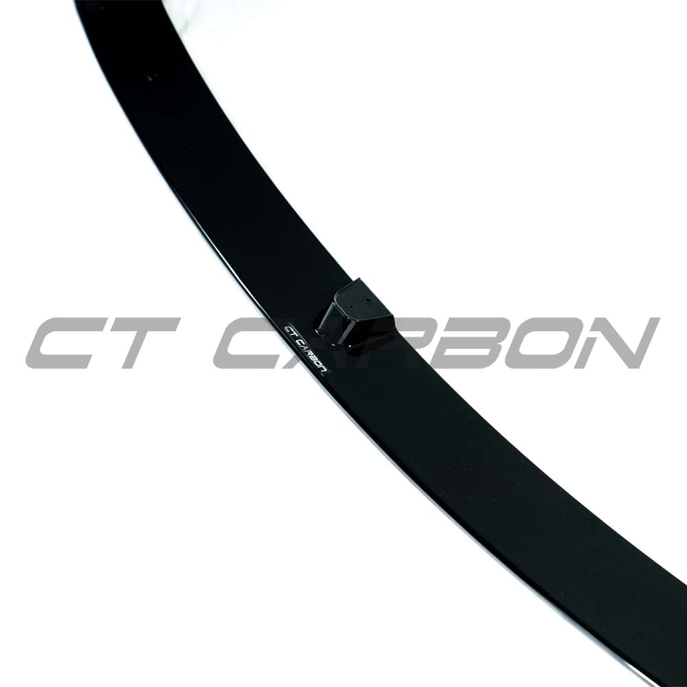 Gloss black BMW M3 M4 F80 F82 F83 splitter by CT Carbon, showcasing a sleek, aerodynamic front splitter design.