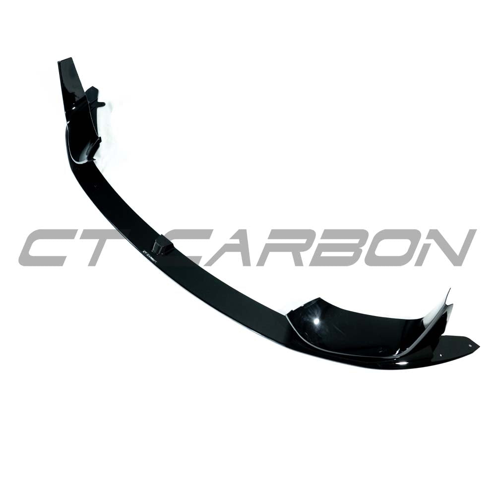 Gloss black splitter for BMW M3 M4 F80 F82 F83 (2014-2020) by CT Carbon, showing the aerodynamic front splitter design.
