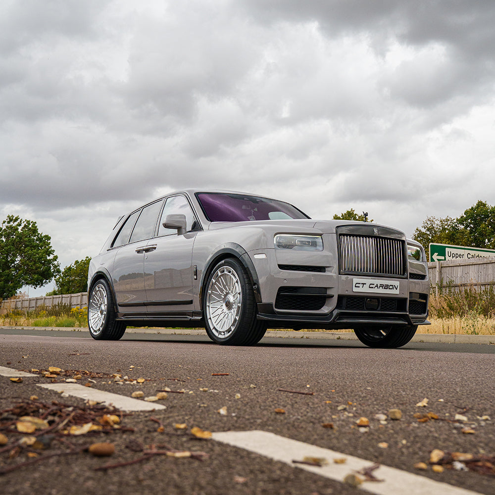 Full view of the CT Design Rolls Royce Cullinan with carbon fiber kit, showcasing sleek black carbon fiber panels on the luxury SUV.