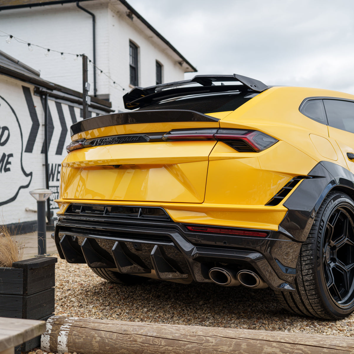 Lamborghini Urus Performante full carbon fibre kit by CT Carbon, showing detailed exterior components on a luxury SUV.