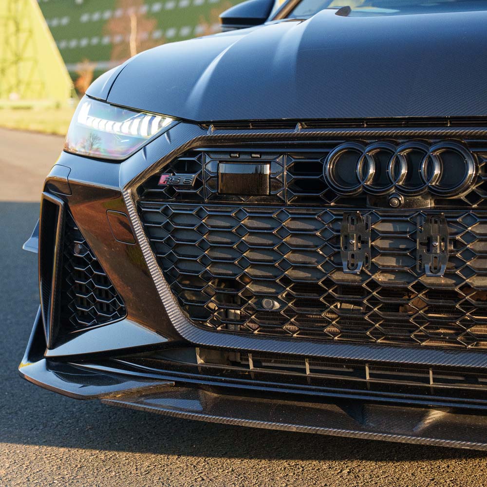 Audi RS6 C8 2019+ CT Design full carbon fiber kit, including front splitter, side skirts, and rear diffuser, on a white background.