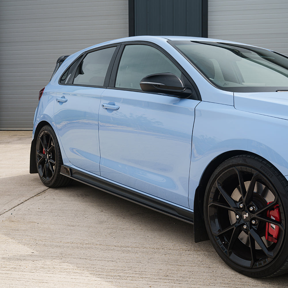 HYUNDAI i30N carbon fibre kit by CT Carbon, facelift version, includes front and rear components, sleek carbon fibre finish.