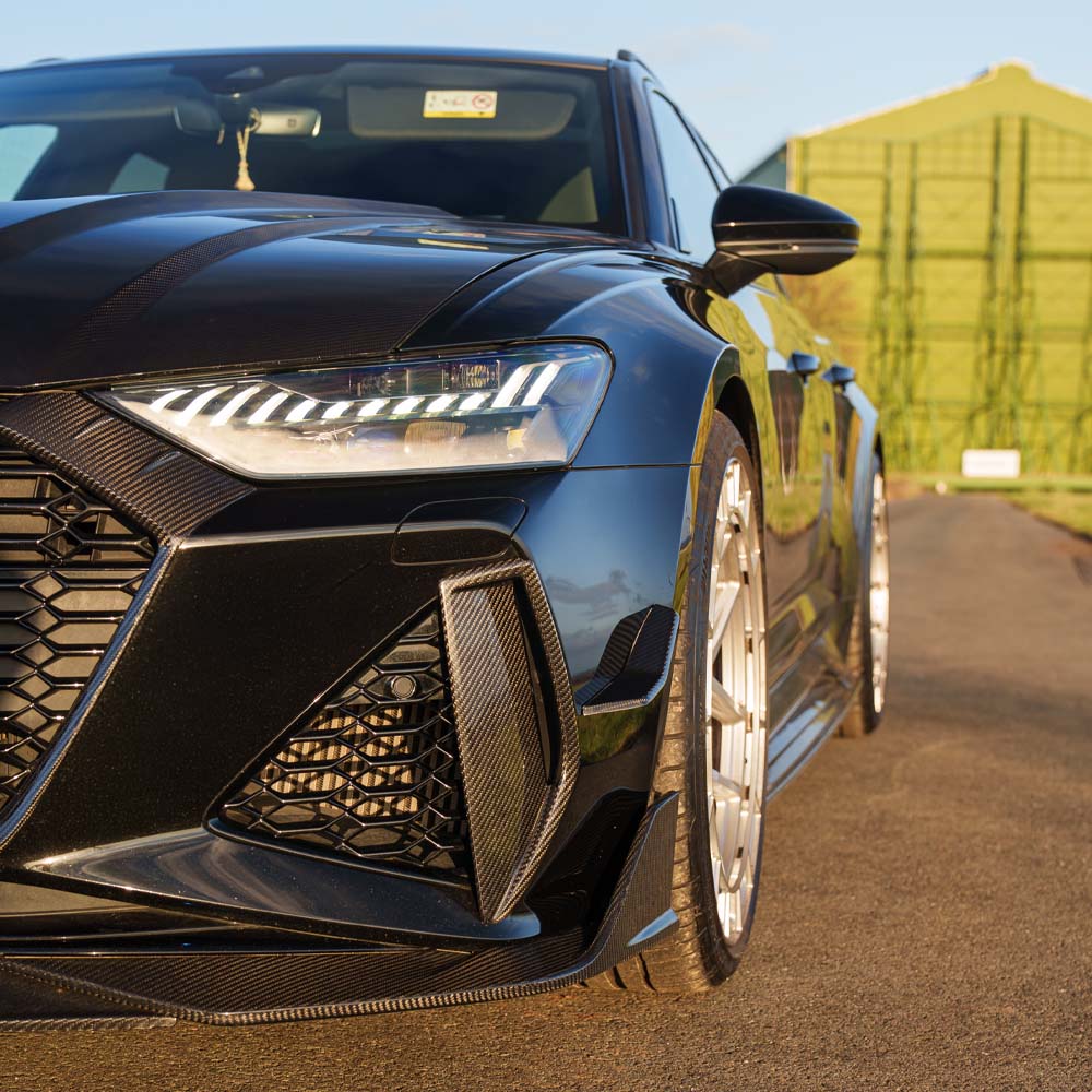 Carbon fiber front end kit for Audi RS6 C8 2019+ by CT Carbon, showing the sleek, lightweight aerodynamic design in the image.