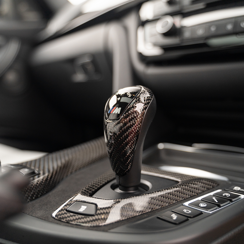 CT Carbon shift knob for BMW M series F10, F12, F13, F80, F82, F83, F87 models, featuring sleek carbon fiber design.