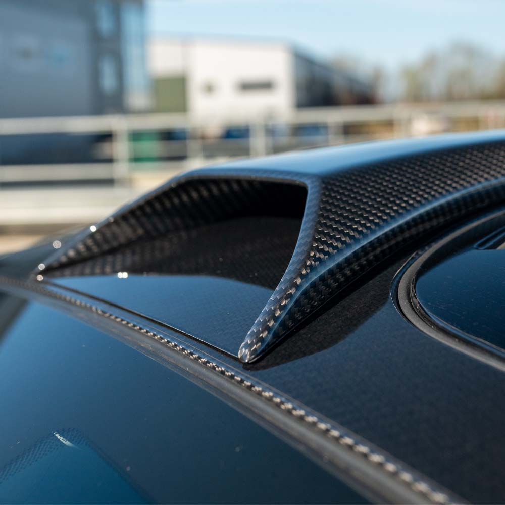 Carbon fiber kit for McLaren 720S by CT Carbon, featuring sleek design elements and high-quality materials.