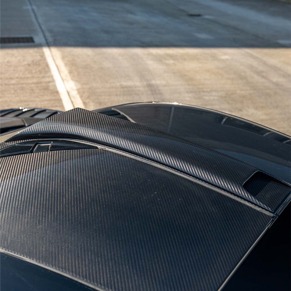 CT Carbon McLaren 720S Ultimate Kit installation image showing detailed carbon fiber components on the supercar.