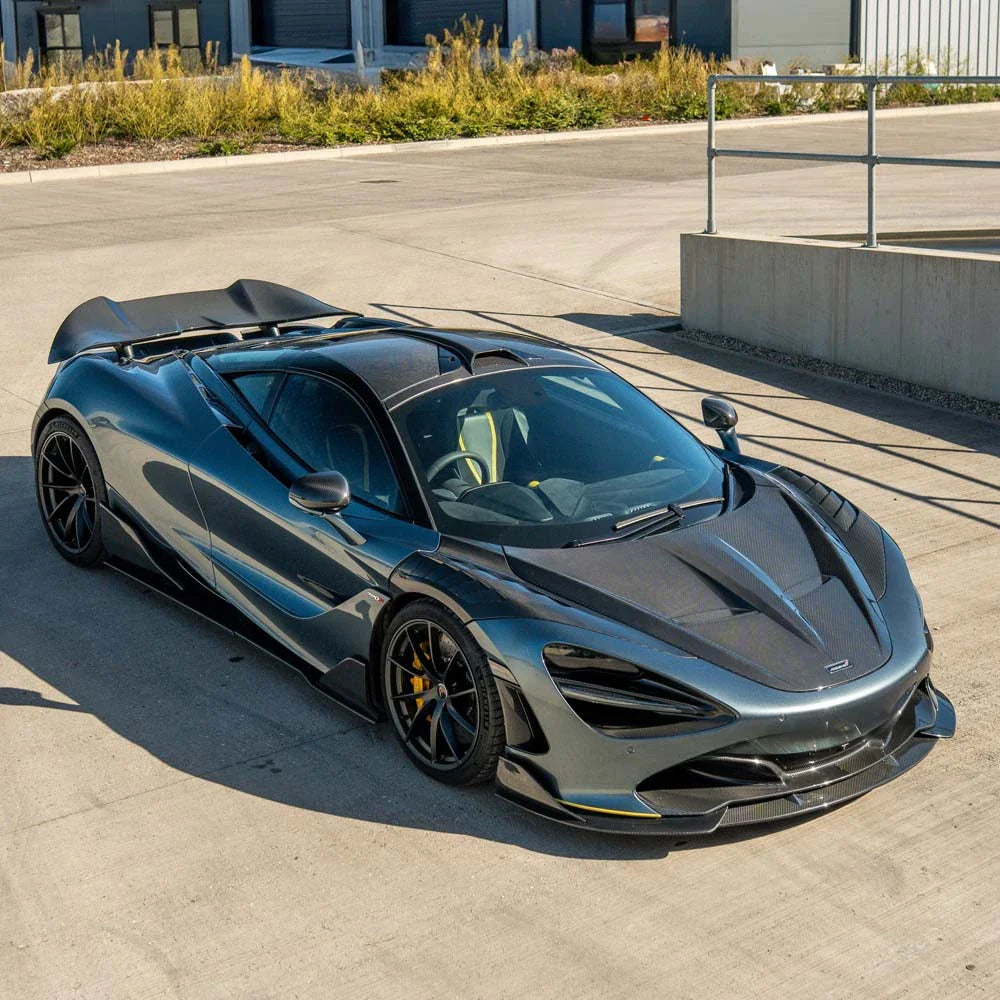 Close-up of a CT Carbon McLaren 720S Ultimate Kit car part with carbon fiber detailing and precision craftsmanship.