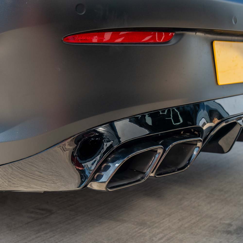 CT Carbon Mercedes C238 2017-2020 E-Class Coupe quad tip diffuser, showcasing sleek carbon fiber design and exhaust tips.
