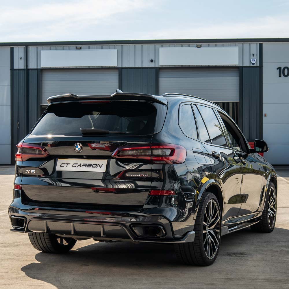 BMW G05 X5 CT Carbon full carbon fiber kit, showing detailed parts and finish on the vehicle's exterior.
