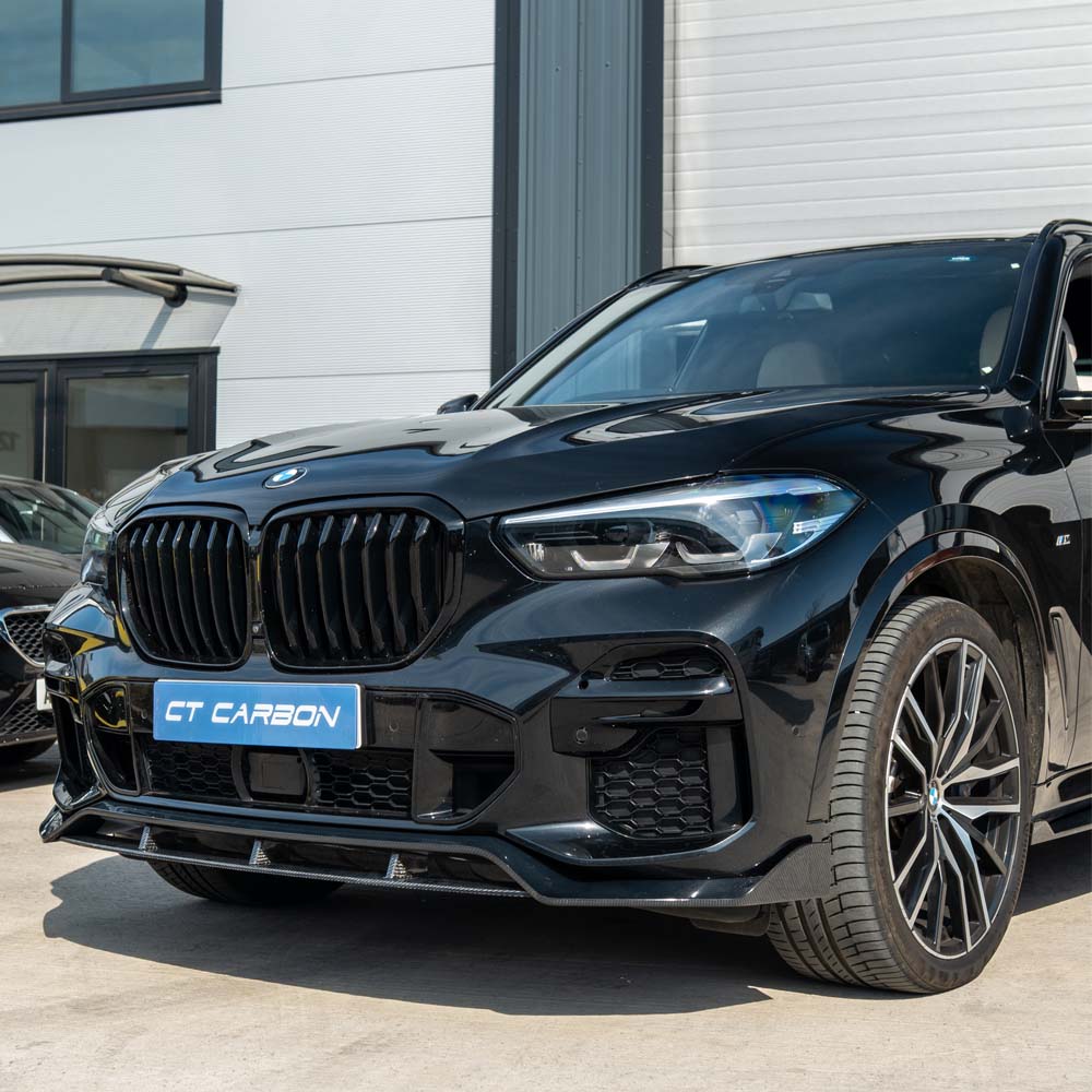 BMW G05 X5 full carbon fibre kit by CT Carbon, showing close-up of carbon fiber panels and detailed finishing on the vehicle.