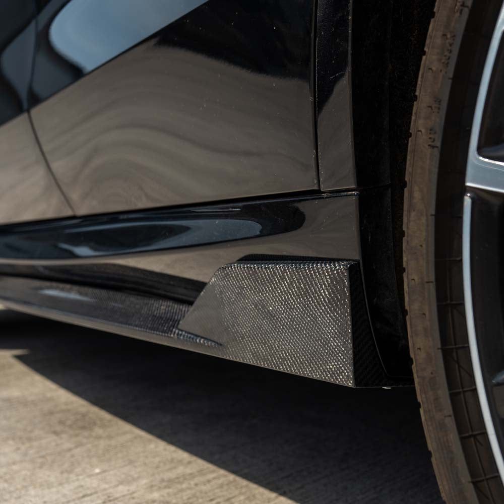BMW G05 X5 CT Carbon full carbon fibre kit, showing sleek, glossy carbon fiber parts for vehicle enhancement.