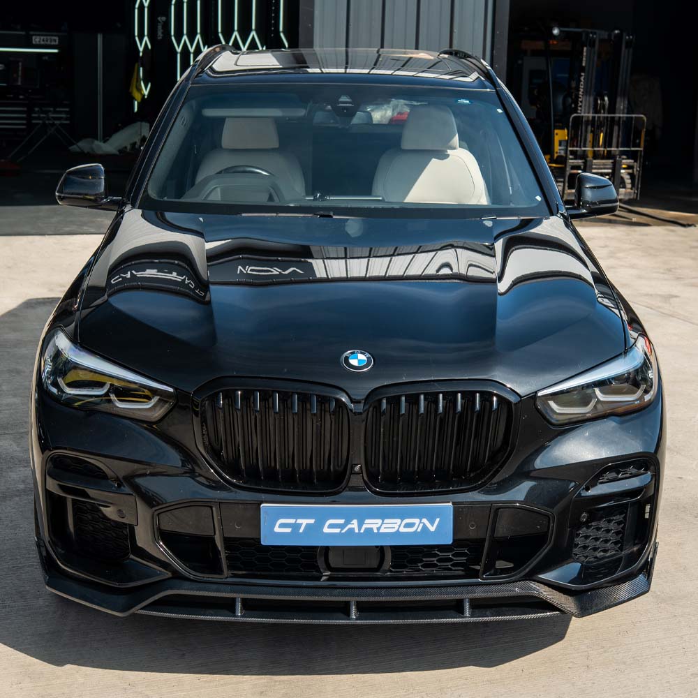BMW G05 X5 CT Carbon full carbon fibre kit, front bumper, side skirts, and rear diffuser components on a white background.
