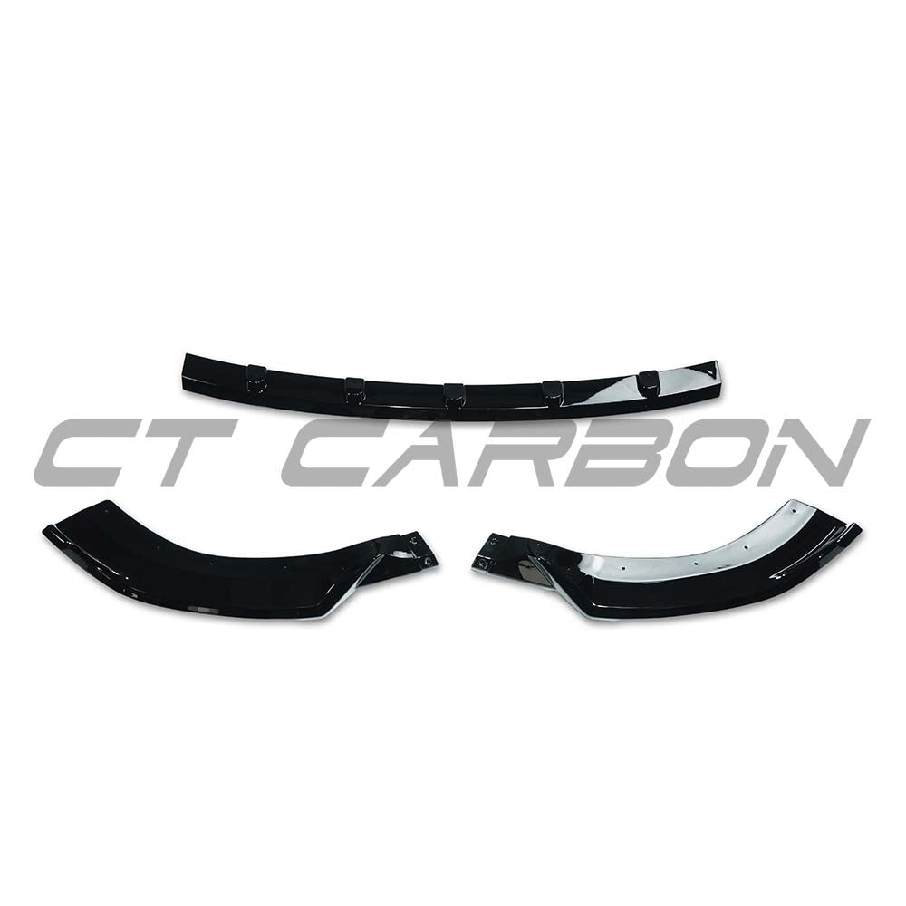 Gloss black CT Carbon splitter installed on Mercedes E-Class W214 2024+, showcasing a sleek aerodynamic upgrade.