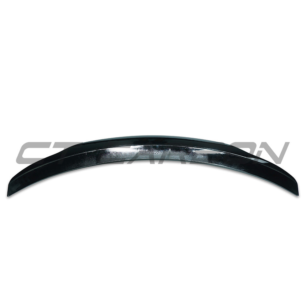 Mercedes C-Class W206 2022+ CT Carbon gloss black rear spoiler V1 installed on the vehicle, enhancing sporty appearance.