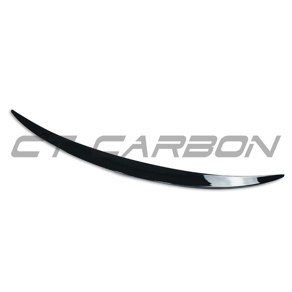 Gloss black CT Carbon spoiler for Mercedes E-Class W214 2024+ shown on vehicle, enhancing rear aerodynamic style.