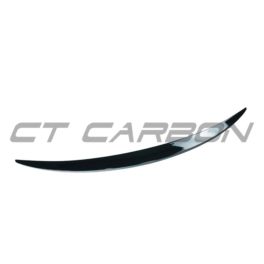 Gloss black CT Carbon spoiler for Mercedes E-Class W214 2024+ shown on a sleek vehicle, enhancing sporty style and aerodynamics.
