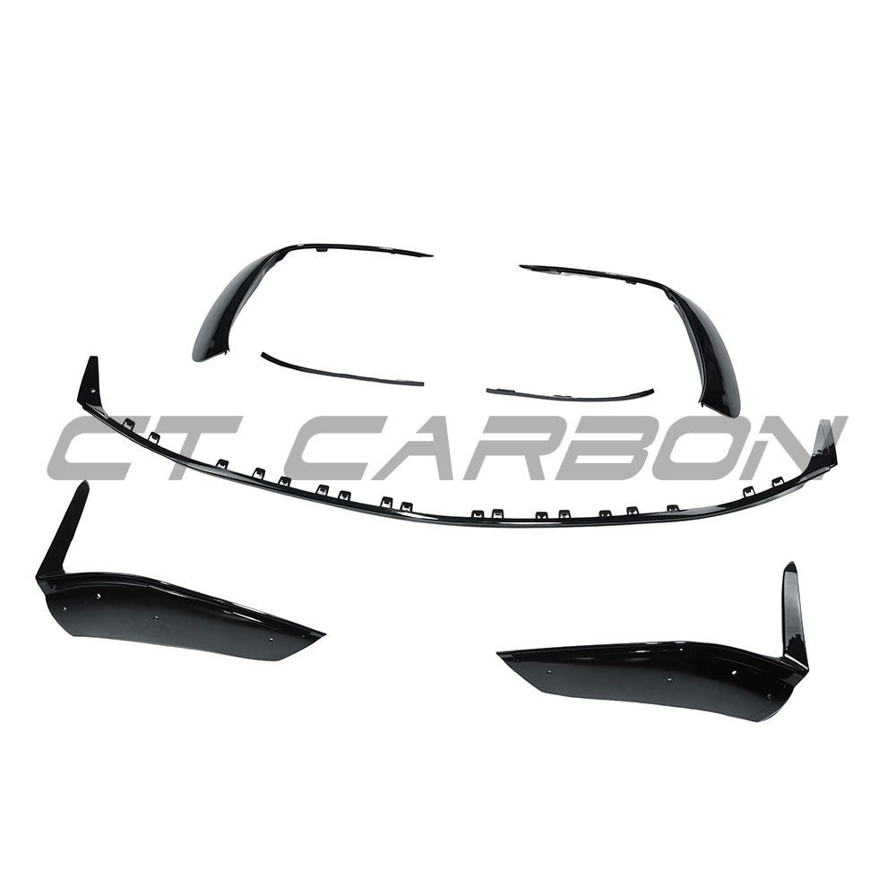 CT Carbon Mercedes W206 2021+ C43 gloss black front splitter installed on vehicle, showcasing sleek aerodynamic design.
