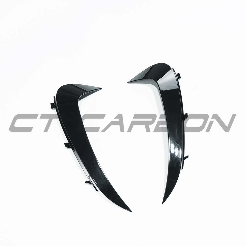 Gloss black rear bumper trim for Mercedes C-Class W206 2021-2023 by CT Carbon, automotive accessories, close-up view.