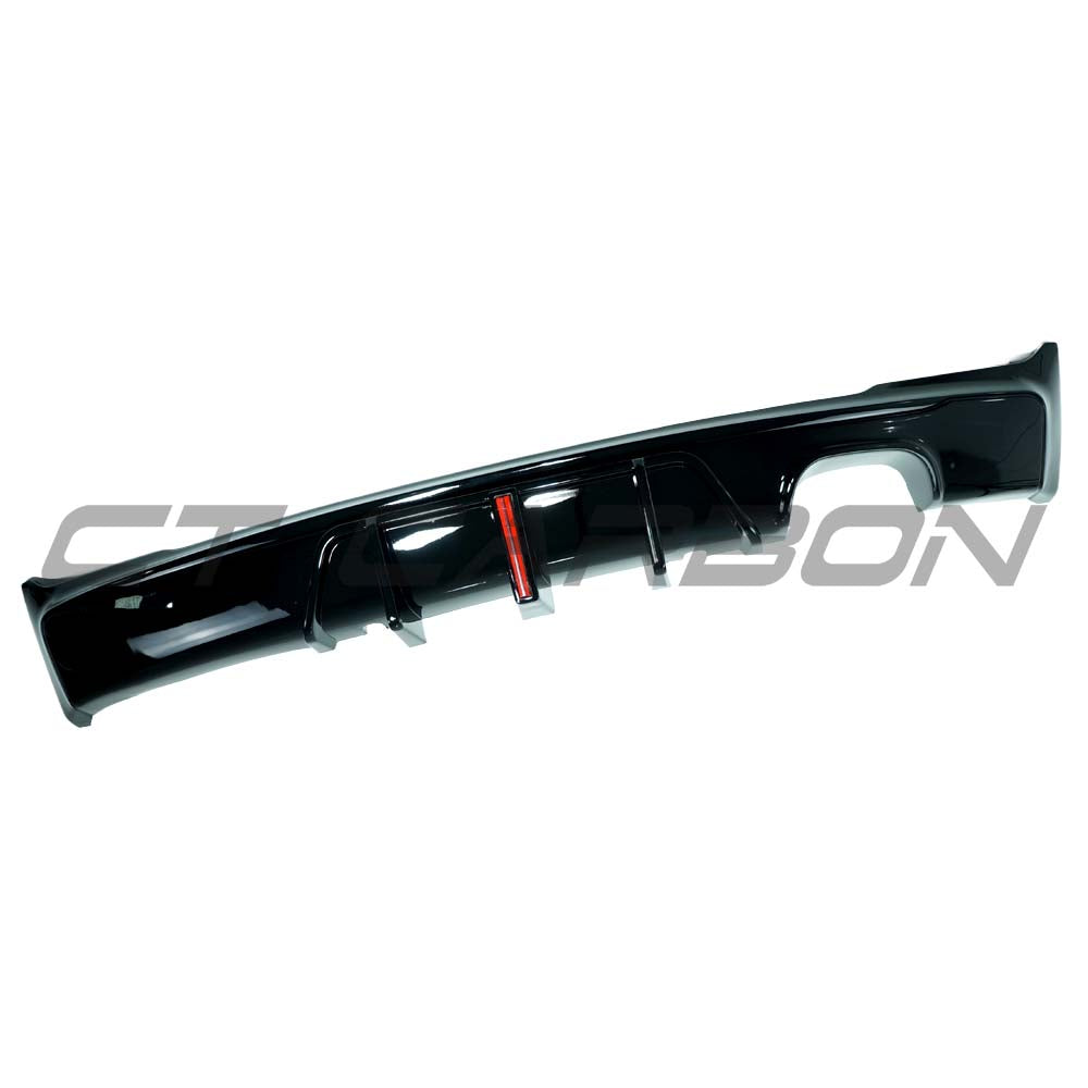 BMW F22/F23 2 Series 2014-2020 CT Carbon gloss black LED twin left diffuser, showing sleek aerodynamic design and installation details.