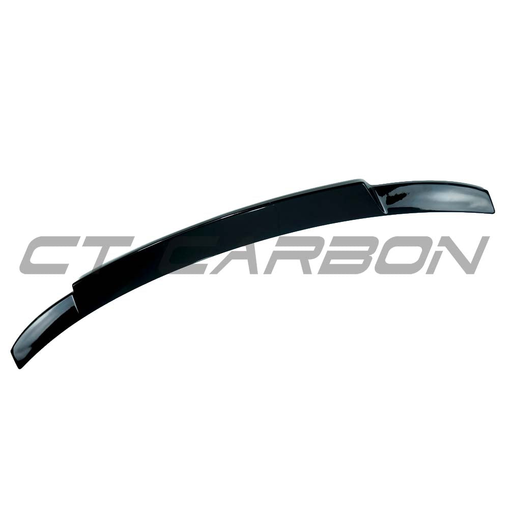 Gloss black BMW F22 2 Series 2014-2020 CT Carbon spoiler installed on the car's rear for aerodynamic enhancement.