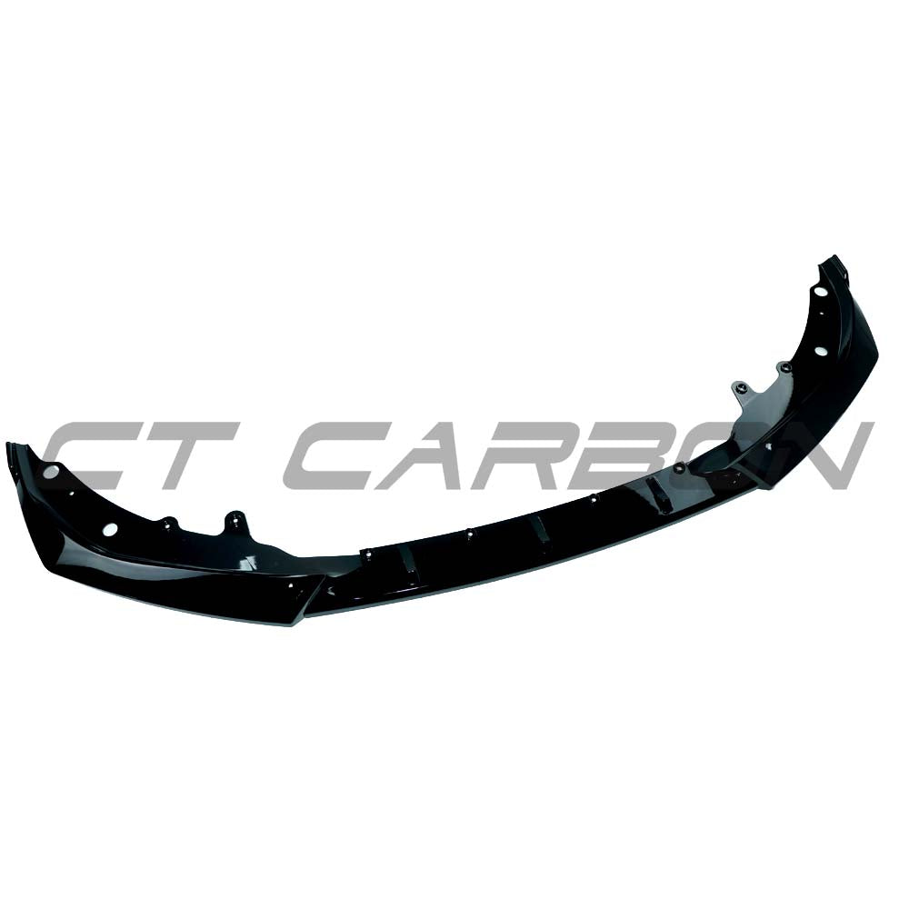 BMW G82 G22 M4 2021+ CT Carbon gloss black 3-piece splitter installed on front bumper, enhancing sporty aerodynamic look.