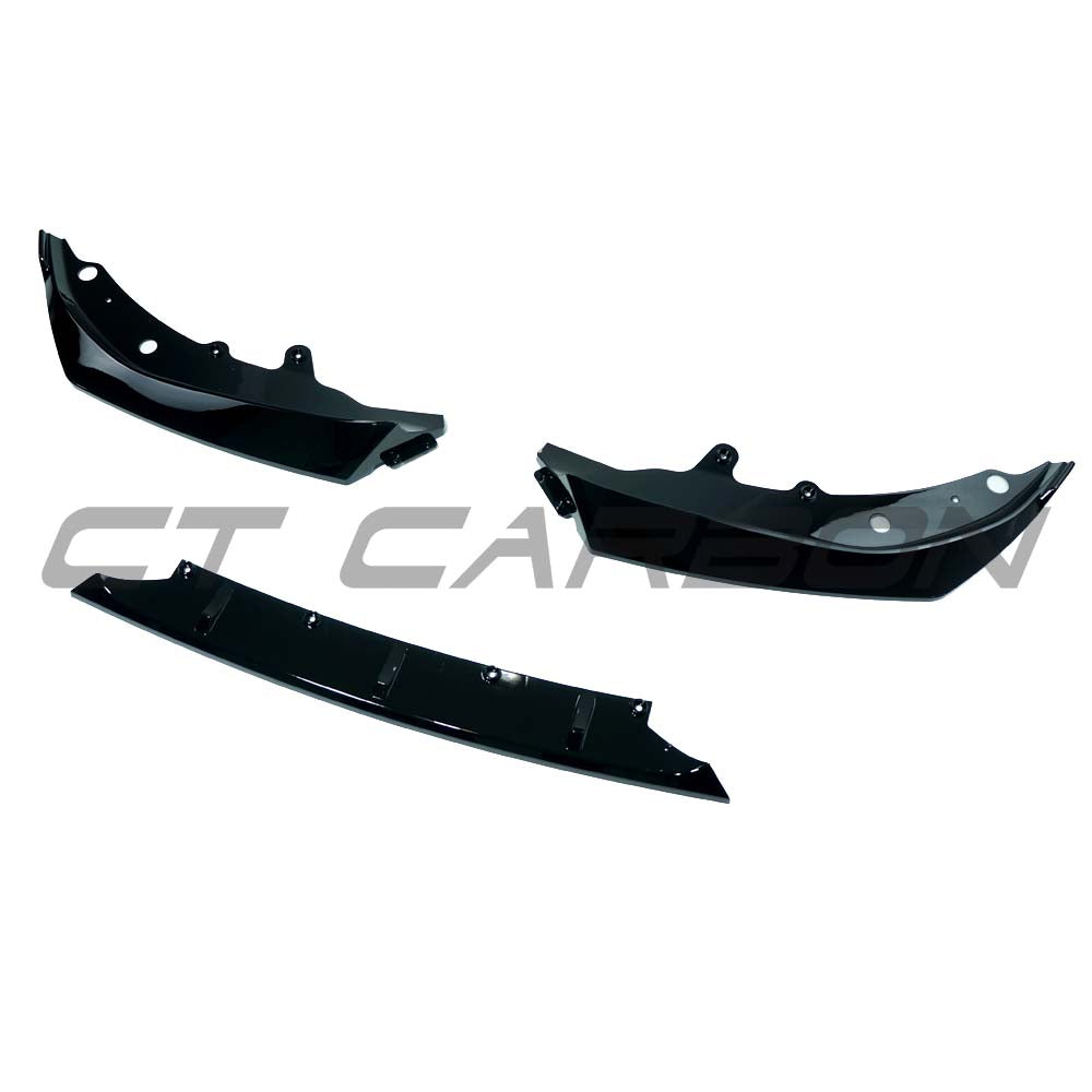 BMW G82 G22 M4 2021+ CT Carbon gloss black 3-piece splitter installed on front bumper, showcasing sleek aerodynamic design.