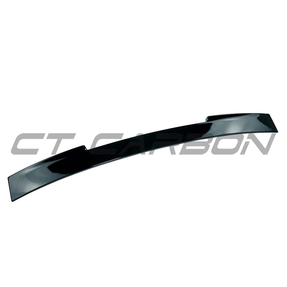 BMW G60 G68 2024+ CT Carbon gloss black spoiler for 5 Series, V2 style, shown on a car with a sleek, aerodynamic design.