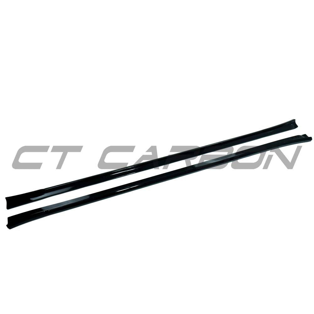 BMW G01 G02 G08 F97 F98 X3 X4 X3M X4M 2018-2022 CT Carbon gloss black side skirts on a vehicle.