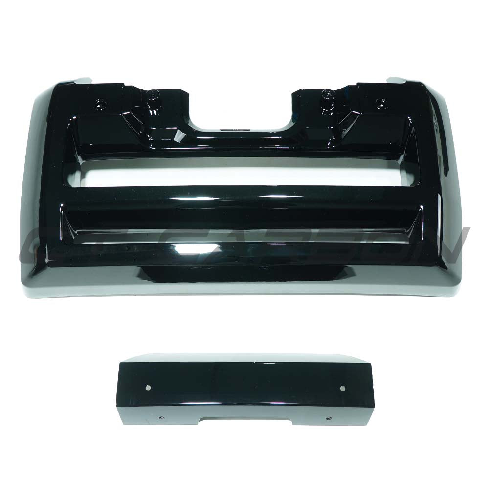 Gloss black front bumper trim for Land Rover Defender L663 2020+ from CT Carbon, shown on vehicle front end.